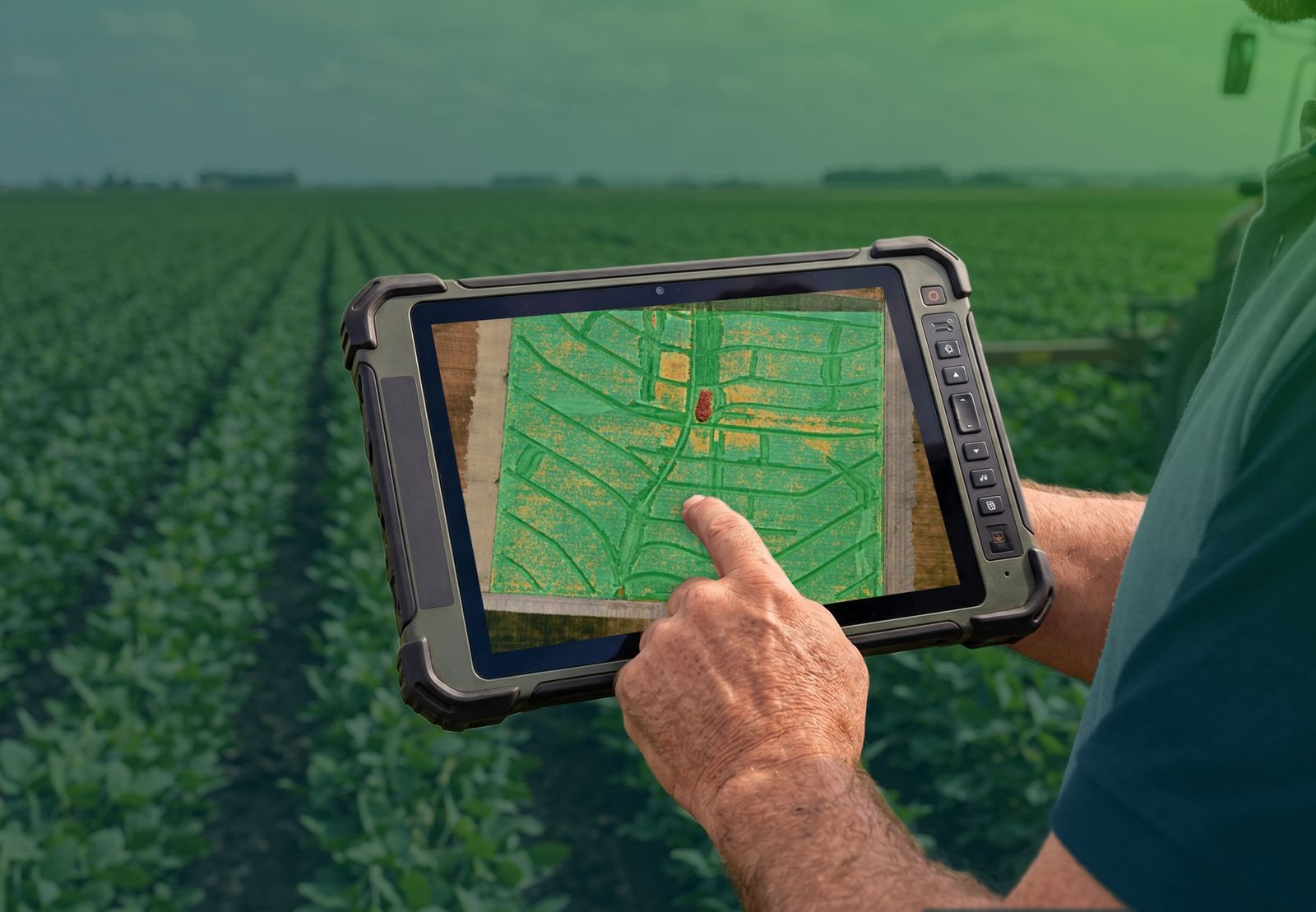 Productor en un lote de soja con una tablet que muestra un mapa de malezas relevado con drone